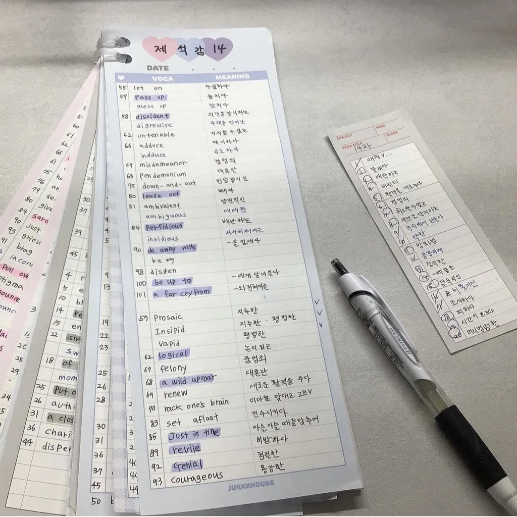 Vertical half-B5 notepad with blue cover, showing 30 pages for English word lists.