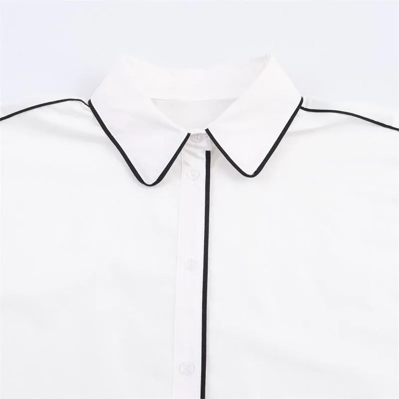 White loose fit poplin shirt with plant and flower print, contrast trim, long sleeves, pullover style