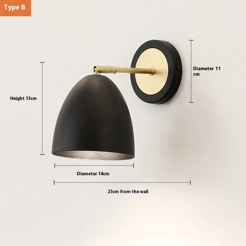 Nordic-style iron wall lamp mounted on a wall beside a bed.