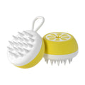 Yellow silicone pet bath brush with massage head and comb side for dog and cat grooming.