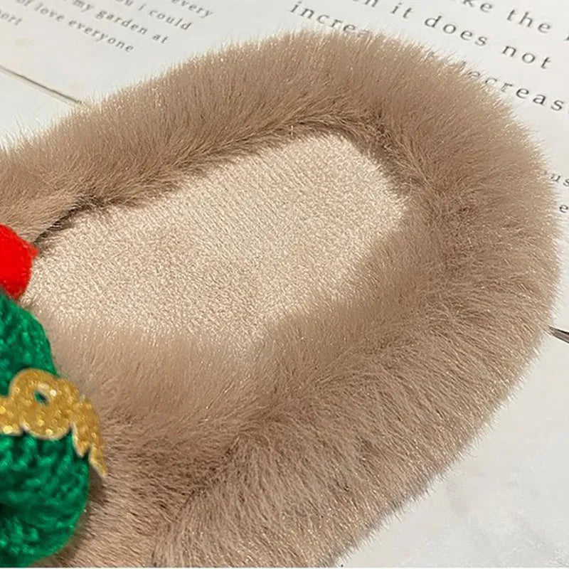 Women's festive slippers with Christmas hat decoration on hairy faux plush upper, shown in black, khaki, or white.