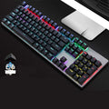 AOC GK410 wired mechanical keyboard with metal top plate and green switch keys on a desk.
