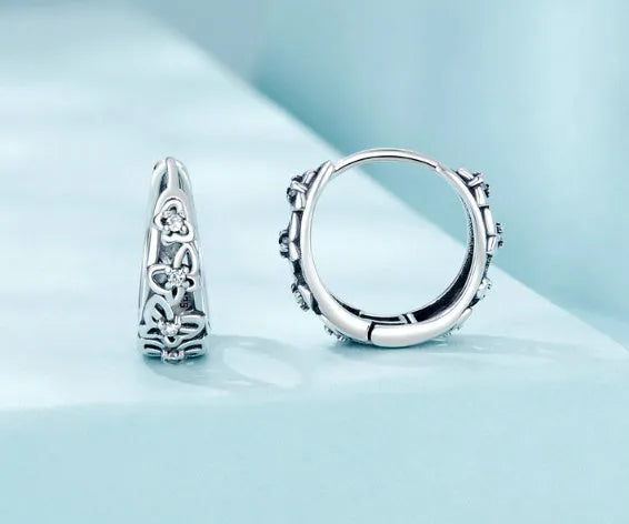 Sterling silver retro hollow butterfly earrings with zircon stones measuring 14mm x 5mm