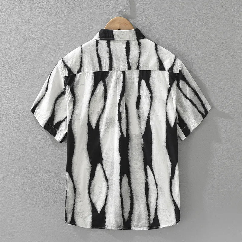 Man wearing a black retro striped short sleeve cardigan-style cotton shirt
