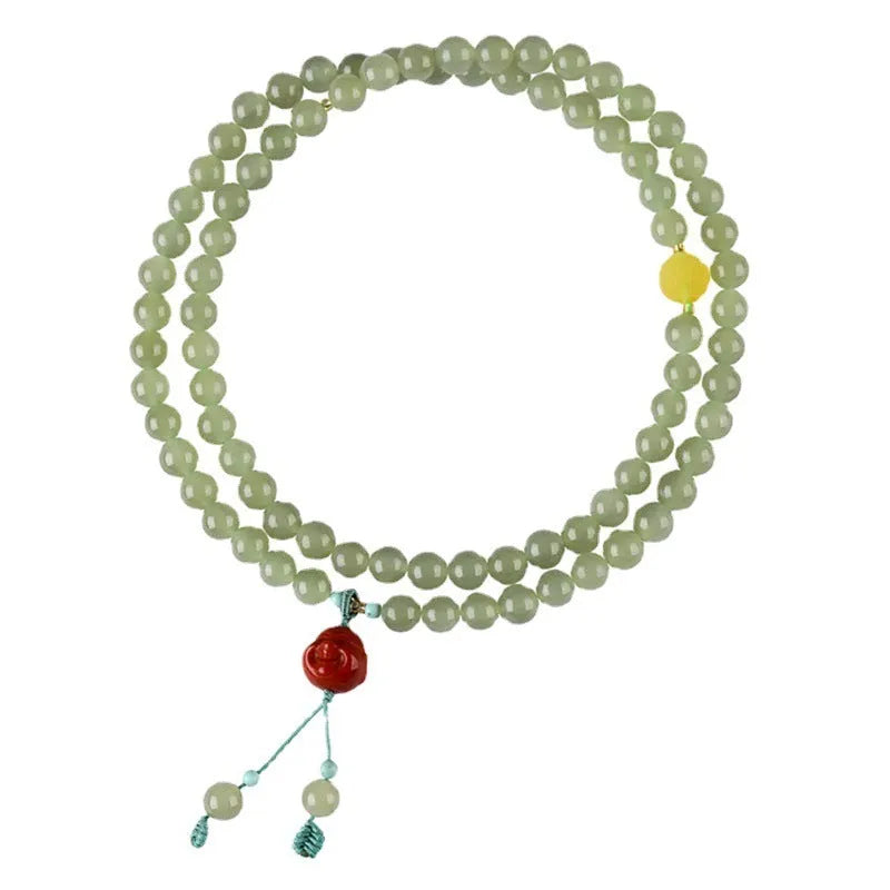 Pale blue Hetian jade bracelet with 6mm beads in three-circle design on wrist