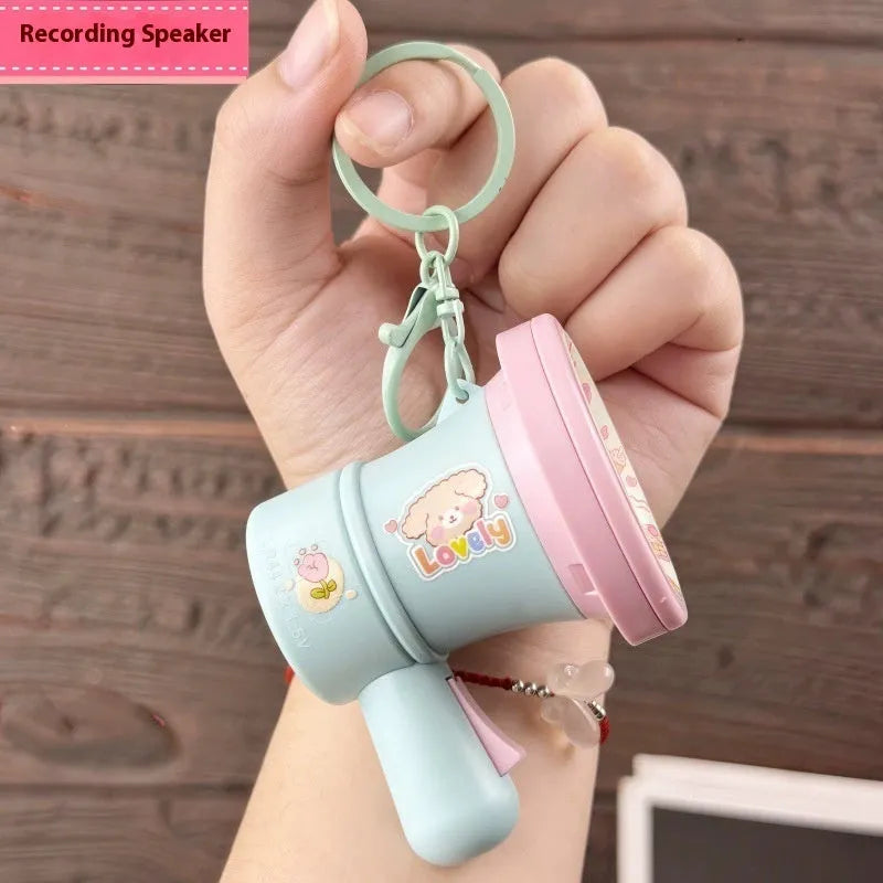 Green cartoon recording horn plastic keychain with integrated ring
