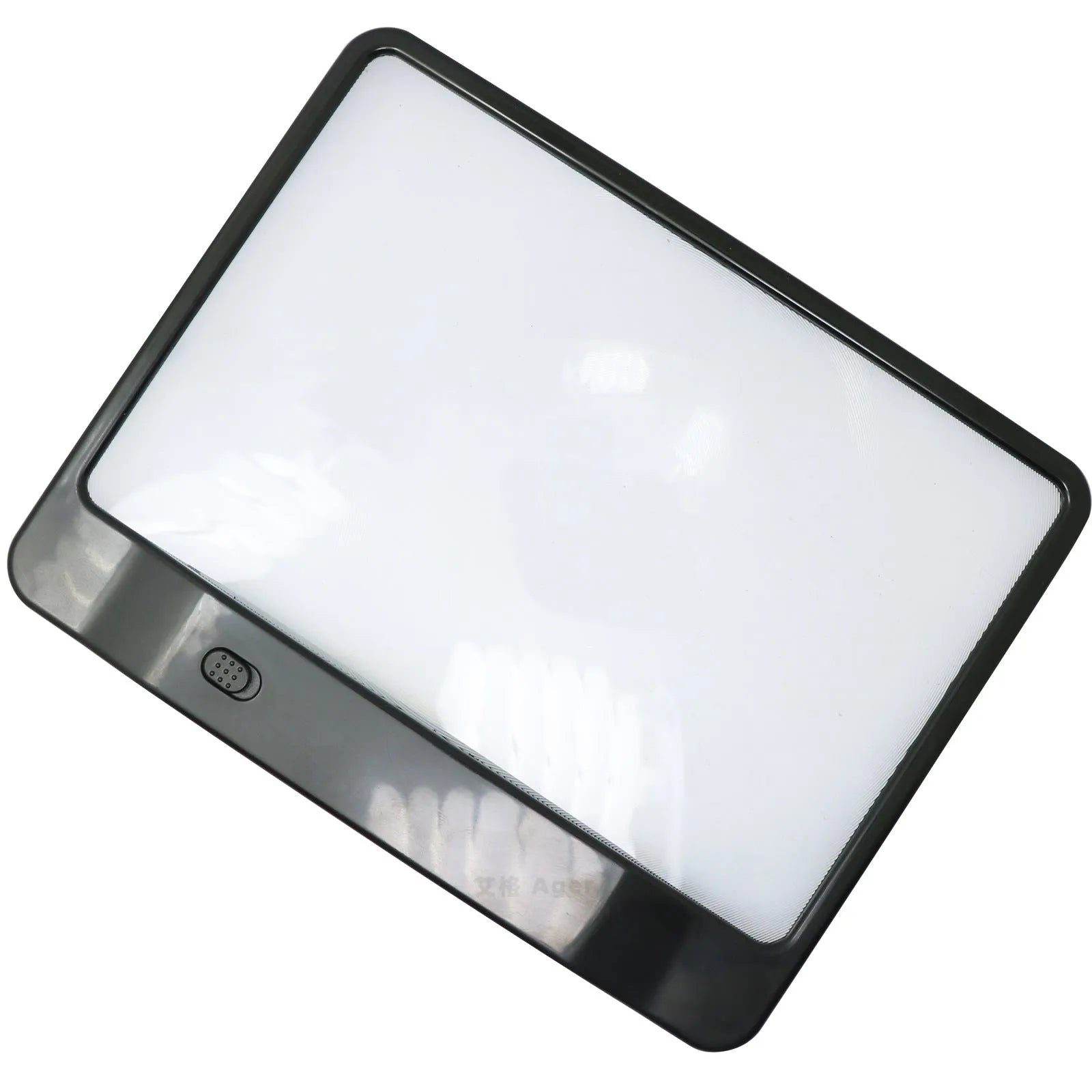 Black and white LED magnifying glass with 3x lens on a desk