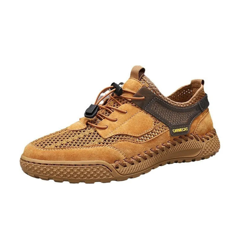 Men's brown suede casual shoes with elastic band closure and hand-stitched sole.