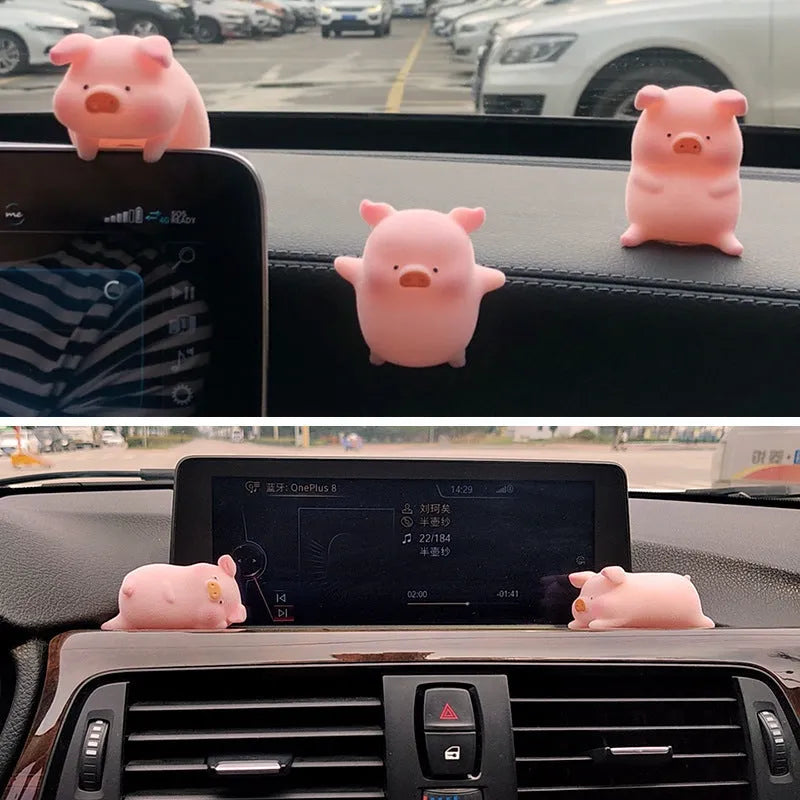 Cute cartoon pig resin figurine car dashboard ornament in one of eight available styles.