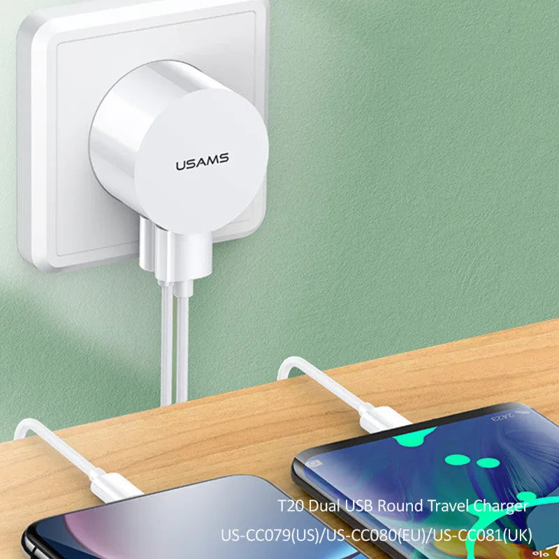 White portable universal dual USB phone charger with UK, EU, and US plugs