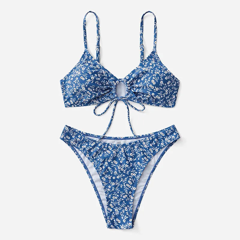 Blue polyester swimsuit three-piece set showing top and shorts for swimming.