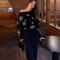 Women's snowflake jacquard pullover Christmas sweater in red with crocheted flowers and boat neck