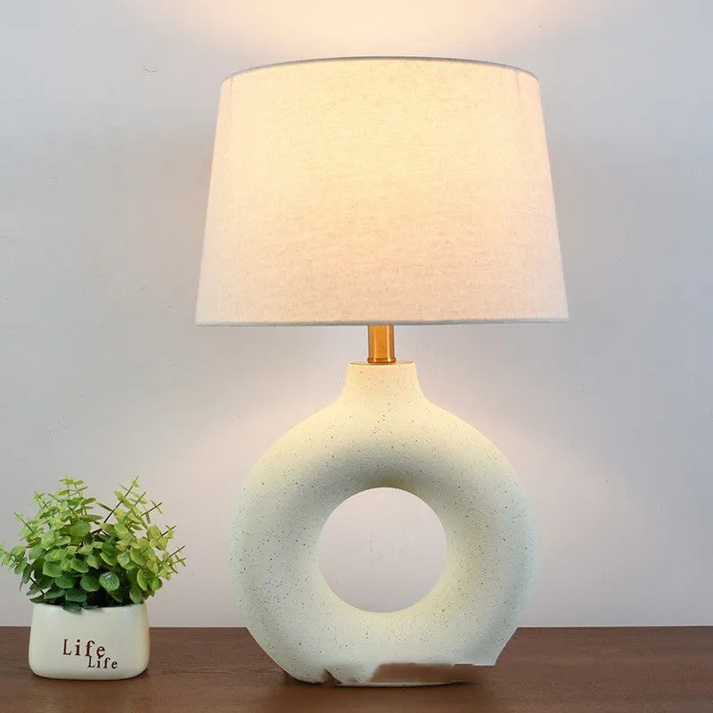 Small white Japanese-style ceramic pottery pot table lamp with a button switch, 52cm tall.