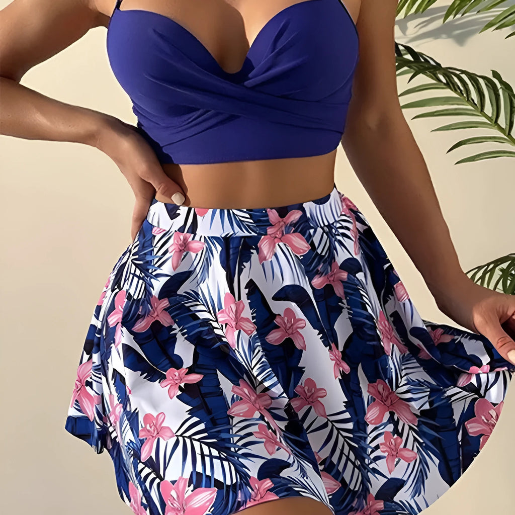 Women's three-piece high-waist bikini swimsuit in polyester fabric showing stomach coverage design