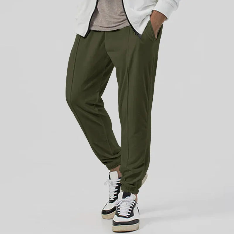 Men's grey straight-leg casual sweatpants with an elasticated waistband on a neutral background.