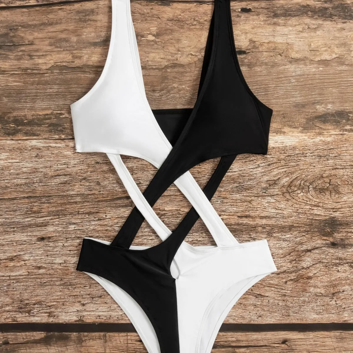 White women's one-piece swimsuit with colour block and hollow out detail.