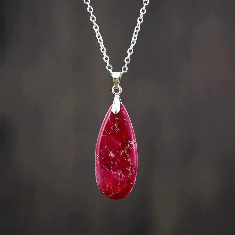 Emperor Stone water drop shaped jade pendant necklace with 18K gold plating on a chain.