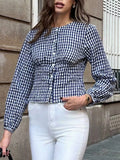 Women's retro casual round neck plaid shirt in dark blue with long sleeves and contrasting splicing, on hanger