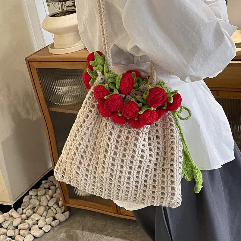 Artistic girls' one-shoulder bag with woven rose bouquet design in pink and red, soft material, double straps