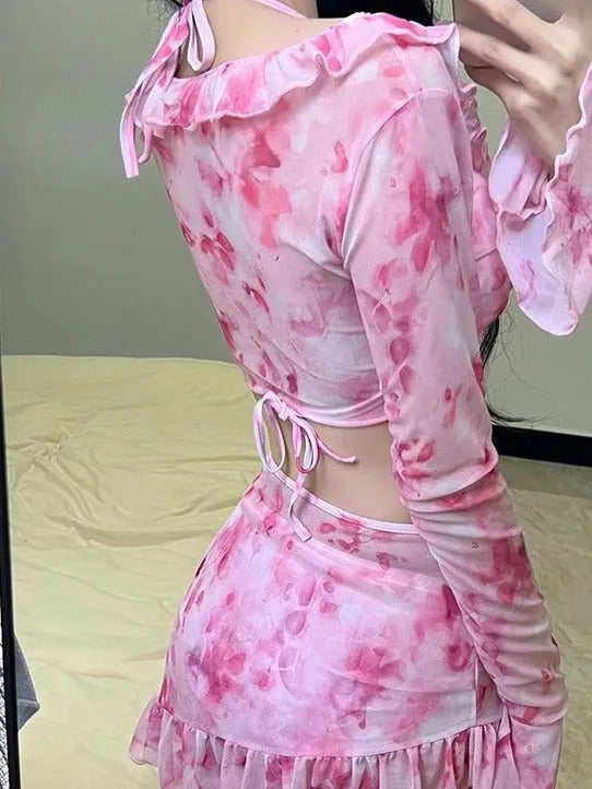 Women's cherry blossom pink floral bikini swimsuit on a mannequin