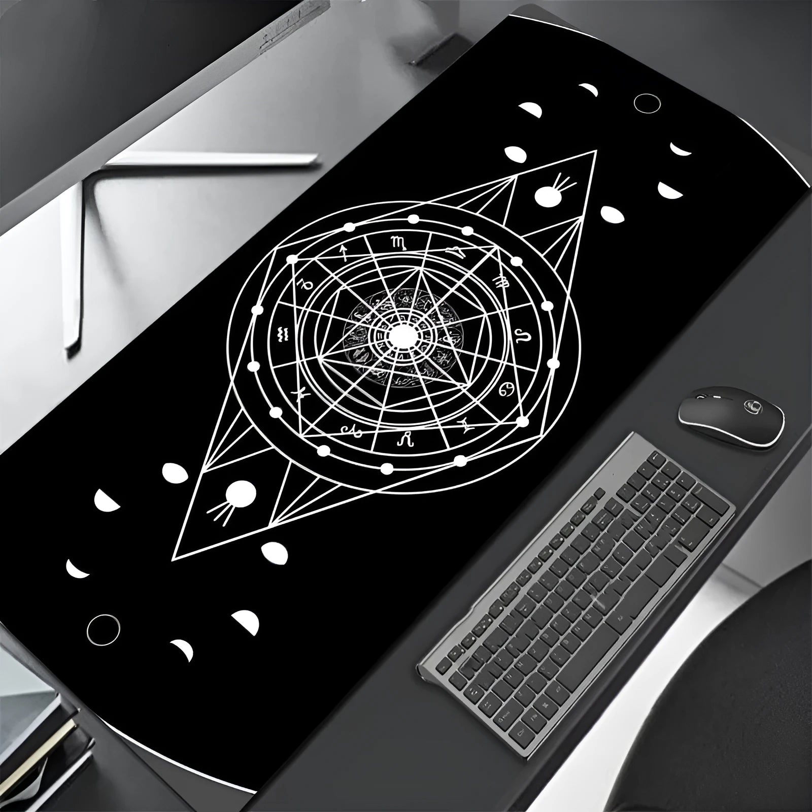 All black extra long mouse pad with precision overlock stitching on a desk