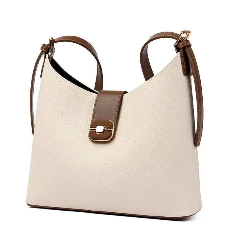 Black PU bucket bag with a single shoulder strap, showing contrast stitching and a lock detail.