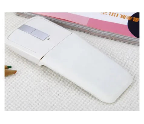 Folding Bluetooth 4.0 touch wireless mouse shown in unfolded position with dimensions 131.2 x 55 x 14.5 mm