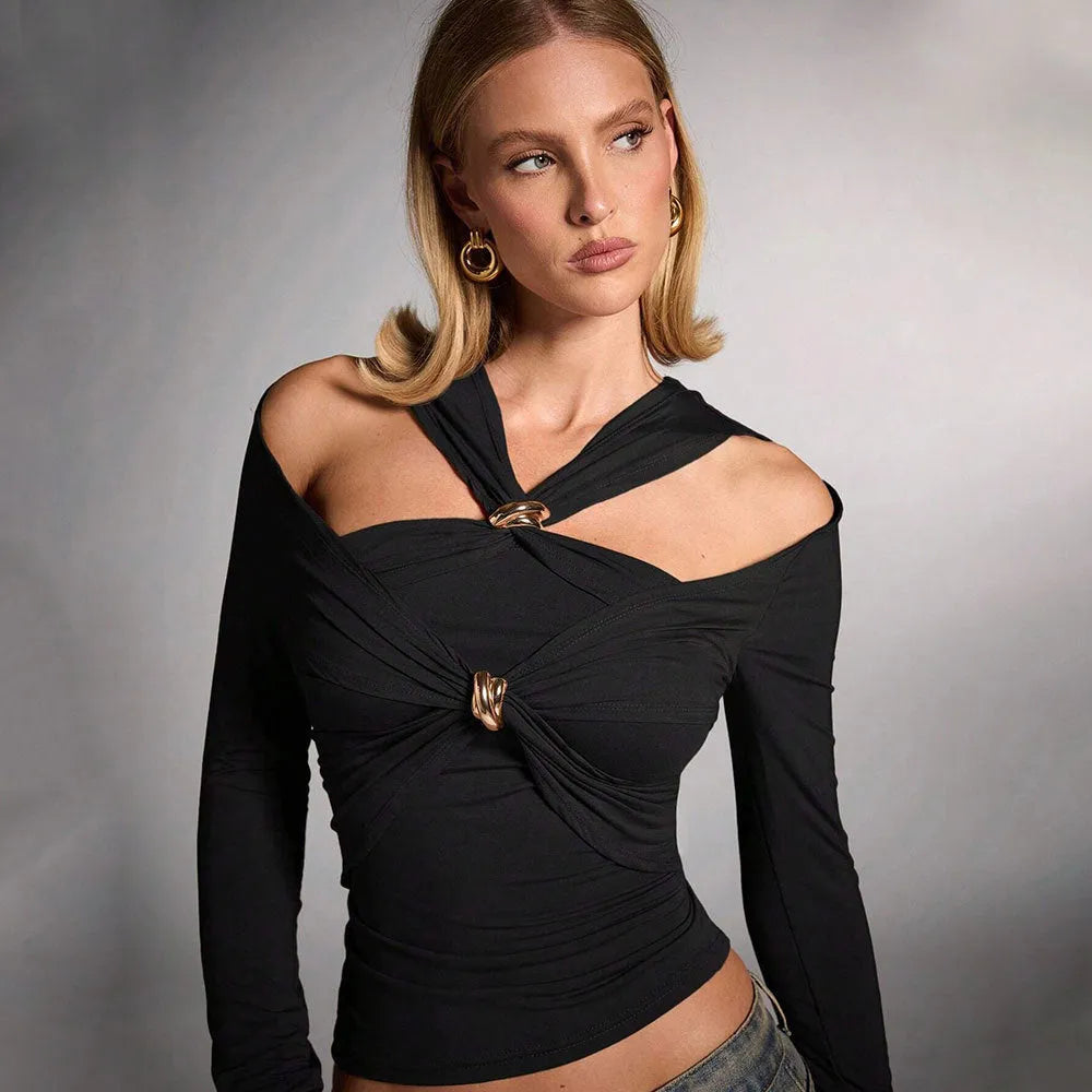 Black women's halter top with long sleeves and a slim fit on a mannequin.