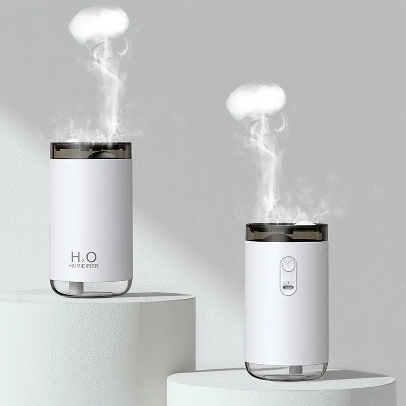 White USB jellyfish humidifier with night light on a wooden desk