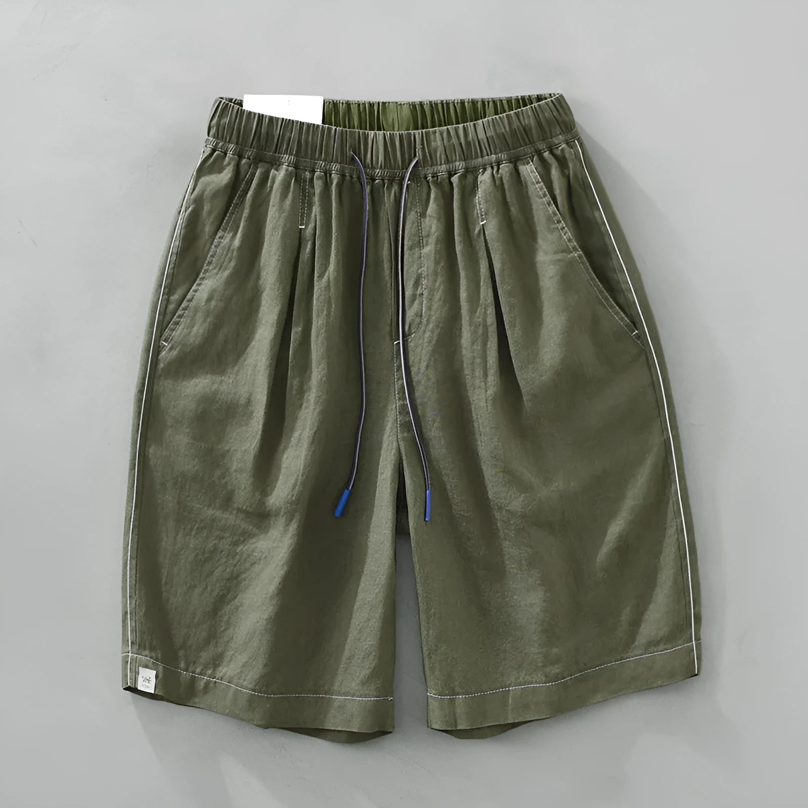 Men's loose straight linen shorts in green or black with drooping casual style