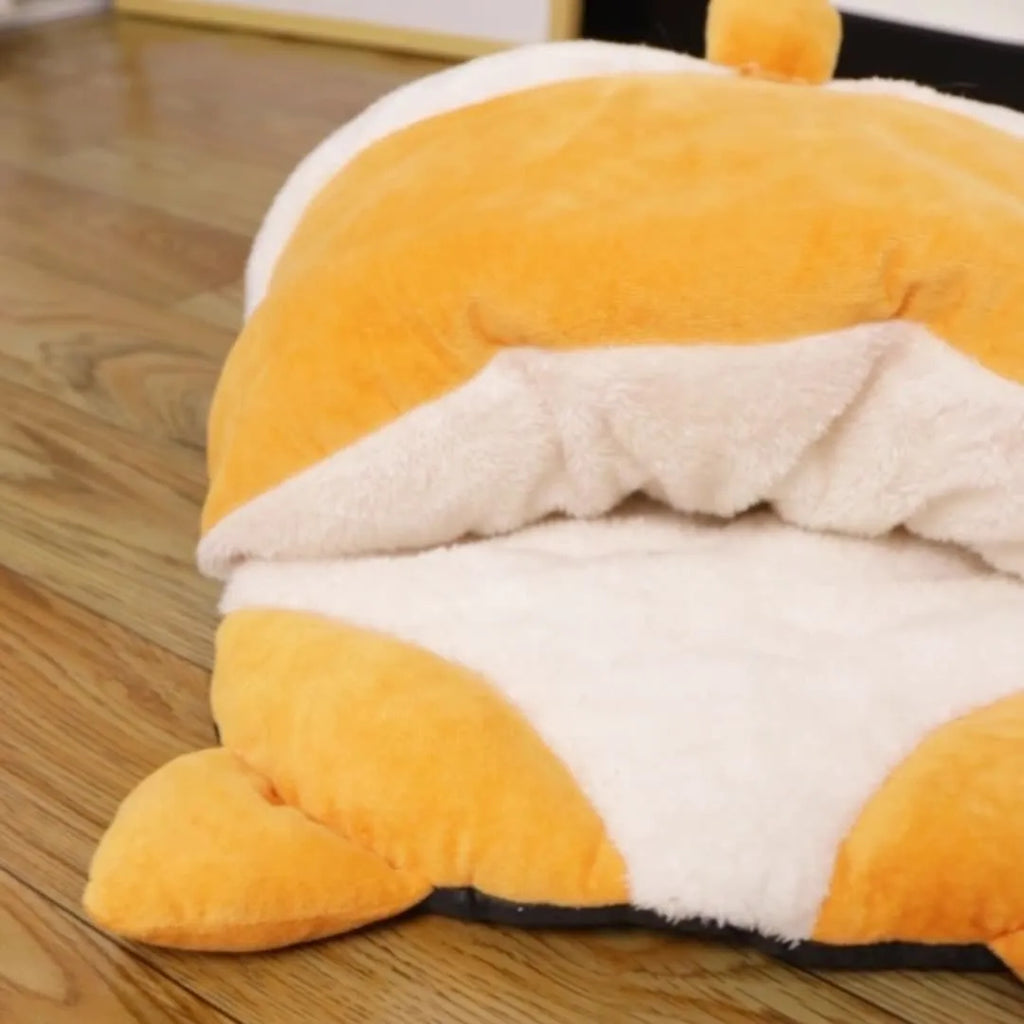 Orange semi-closed cat sleeping bag bed with warm winter design measuring 65x53x12cm
