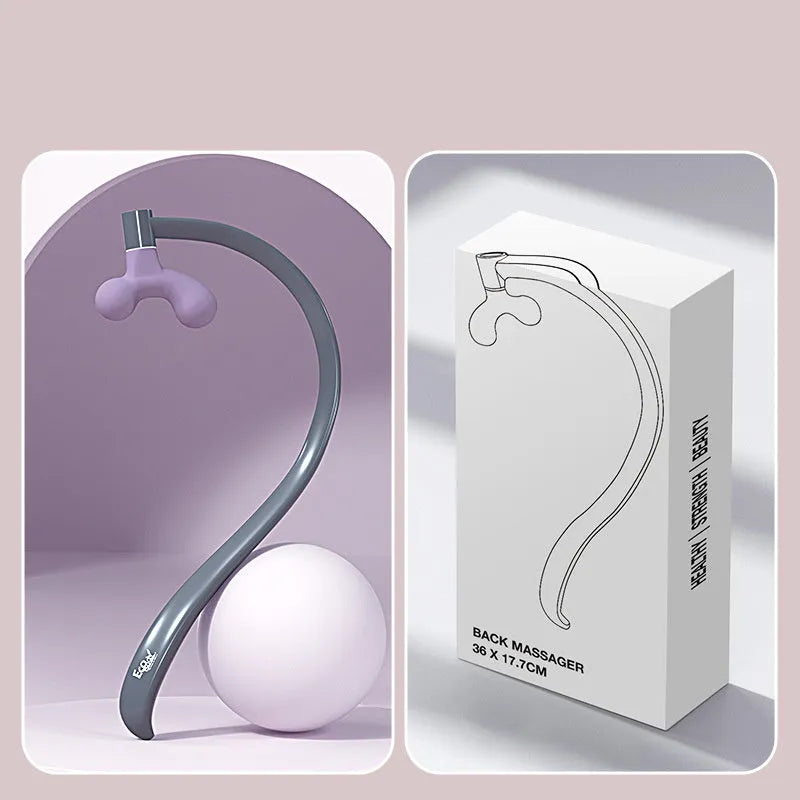 Light purple plastic scapula seam massager hook on a neutral surface