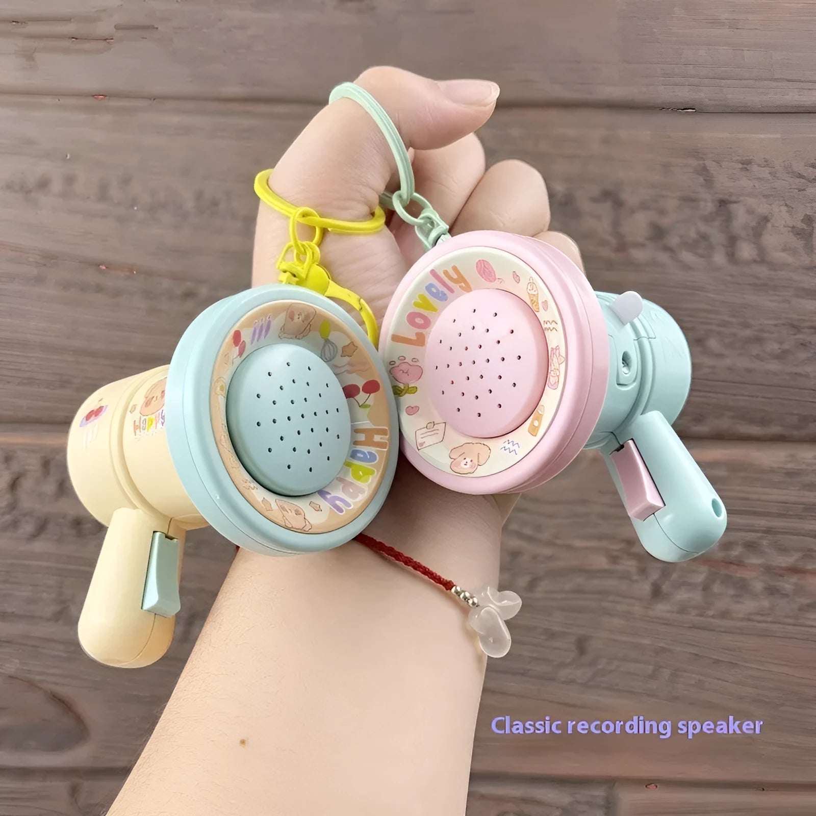 Green cartoon recording horn plastic keychain with integrated ring