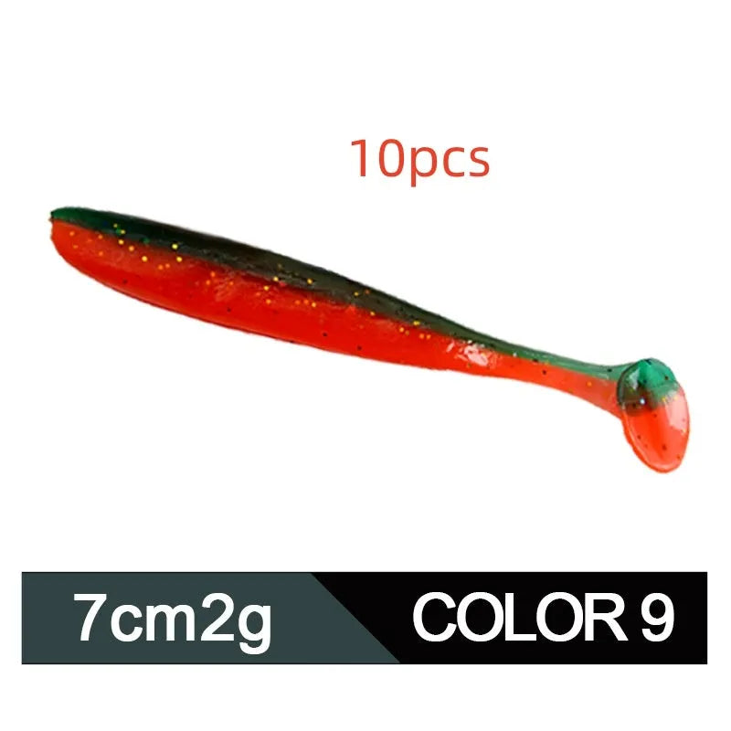 Two-tone soft plastic T-tail fishing lure measuring 7cm, shown in multiple colour variations.