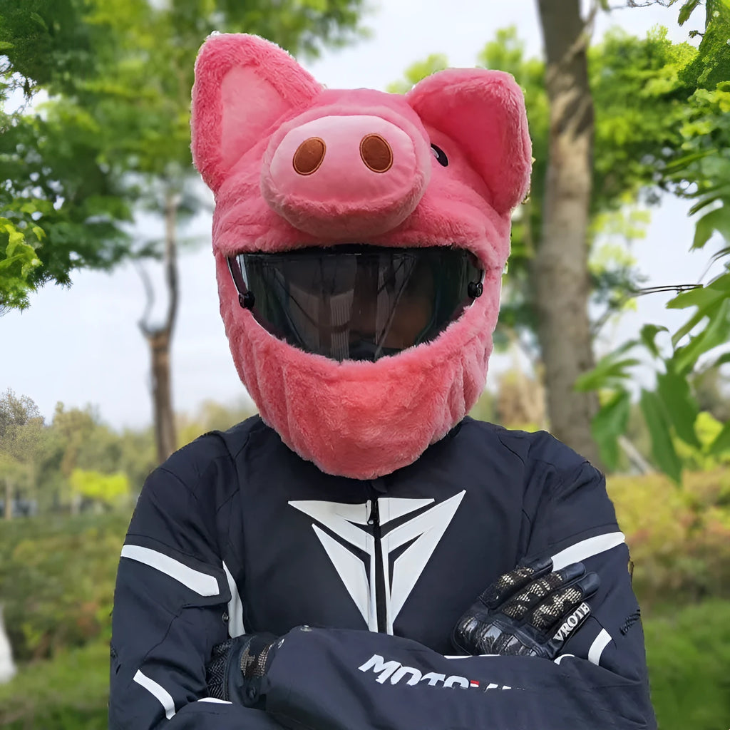 Pink pig cartoon plush protective hood cover for an average-sized motorcycle helmet.