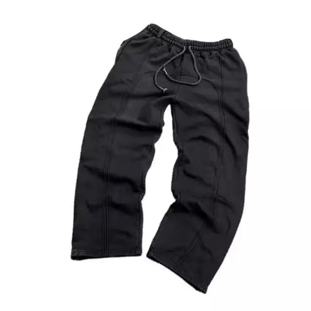 Men's loose fit cropped sweatpants with rope drawstring waist, available in black, gray, and green