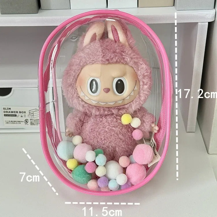 Transparent PVC cube storage bag with cartoon keychain and colourful ball in avocado green.