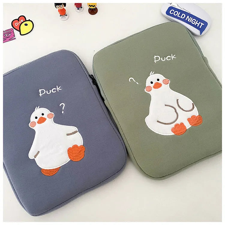 Blue cotton tablet case with duck embroidery, zipper closure, and 11inch to 15to16inch size options