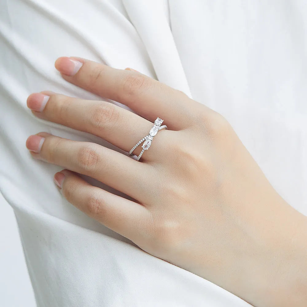 925 silver rotary cross zircon ring with white gold finish on white background
