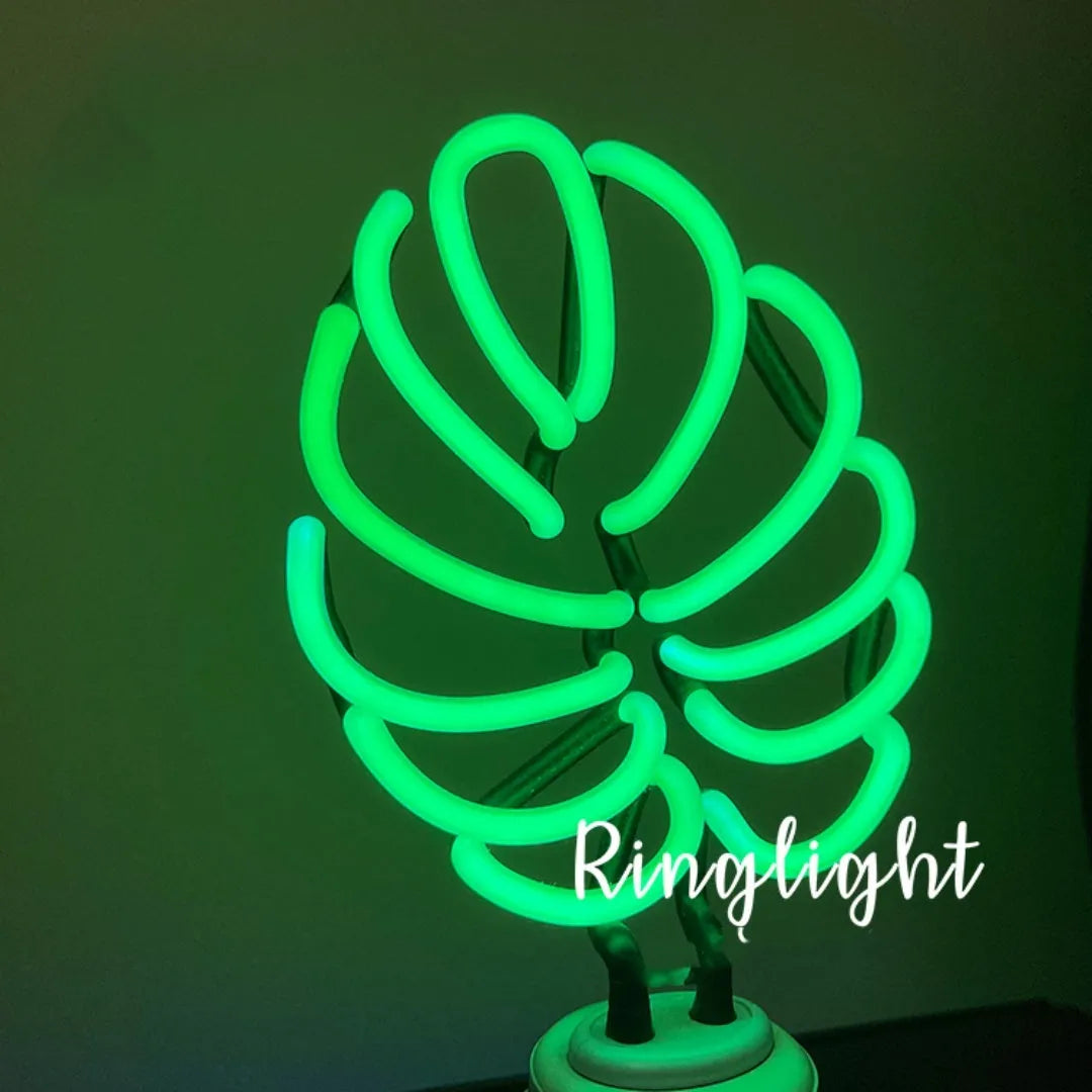 White bamboo-shaped desk lamp with green light, showing USB cable and two size options.