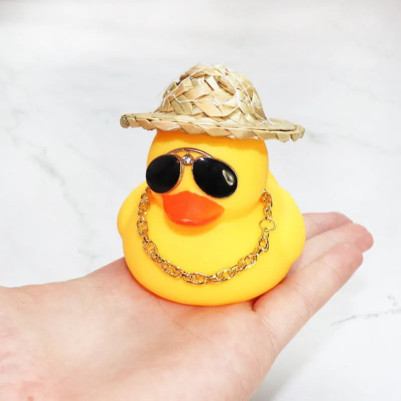 Cartoon straw hat yellow duck car decoration with matte finish on dashboard