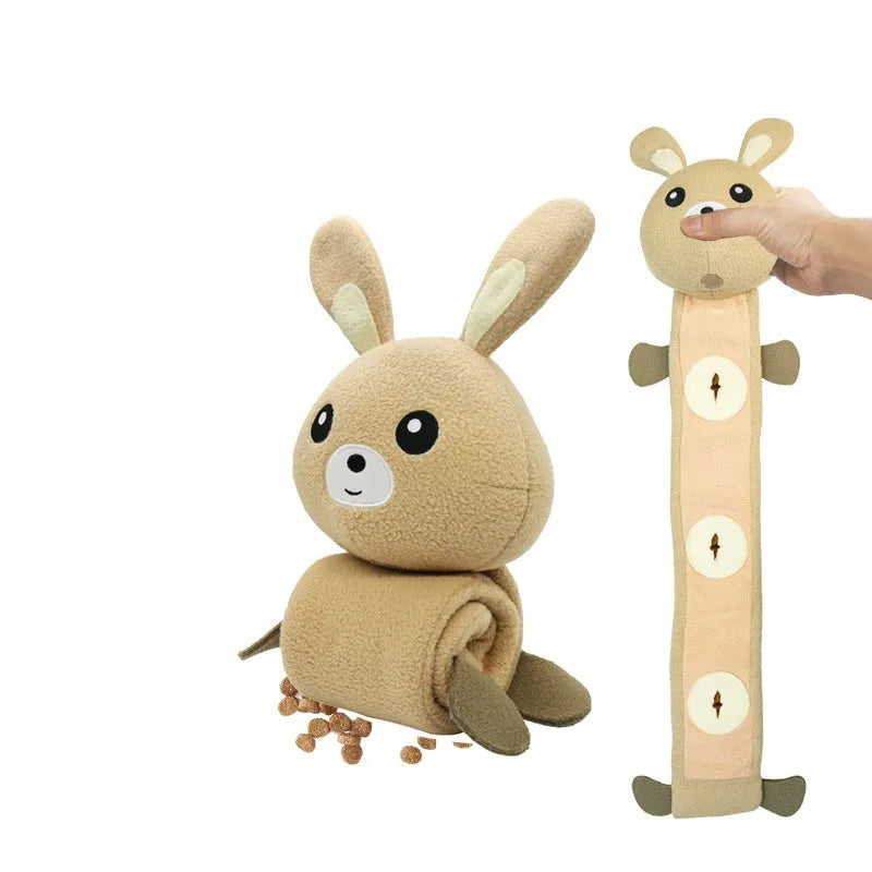 Plush fleece rabbit dog snuffle toy with treat compartments and squeaker, shown on a white background.