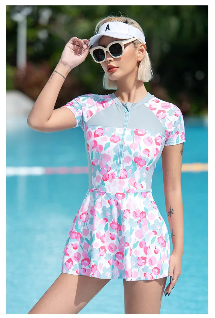 Colour printed plus size one-piece swimsuit on a hanger