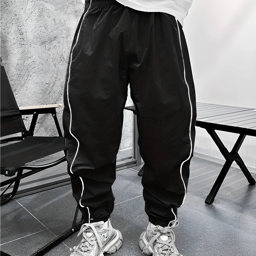 Men's loose fit cropped casual trousers in bamboo fibre, shown in army green colour.