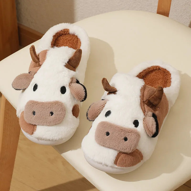 White cow plush slippers with cartoon milk cow pattern and non-slip textured sole