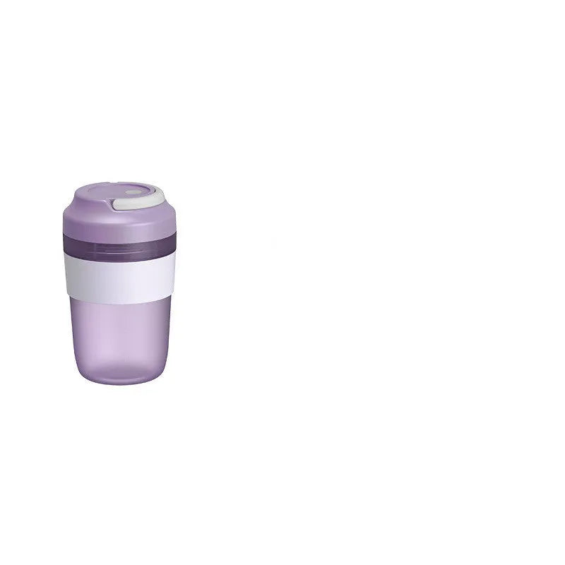 Portable purple blender cup with four stainless steel blades and a USB charging cable