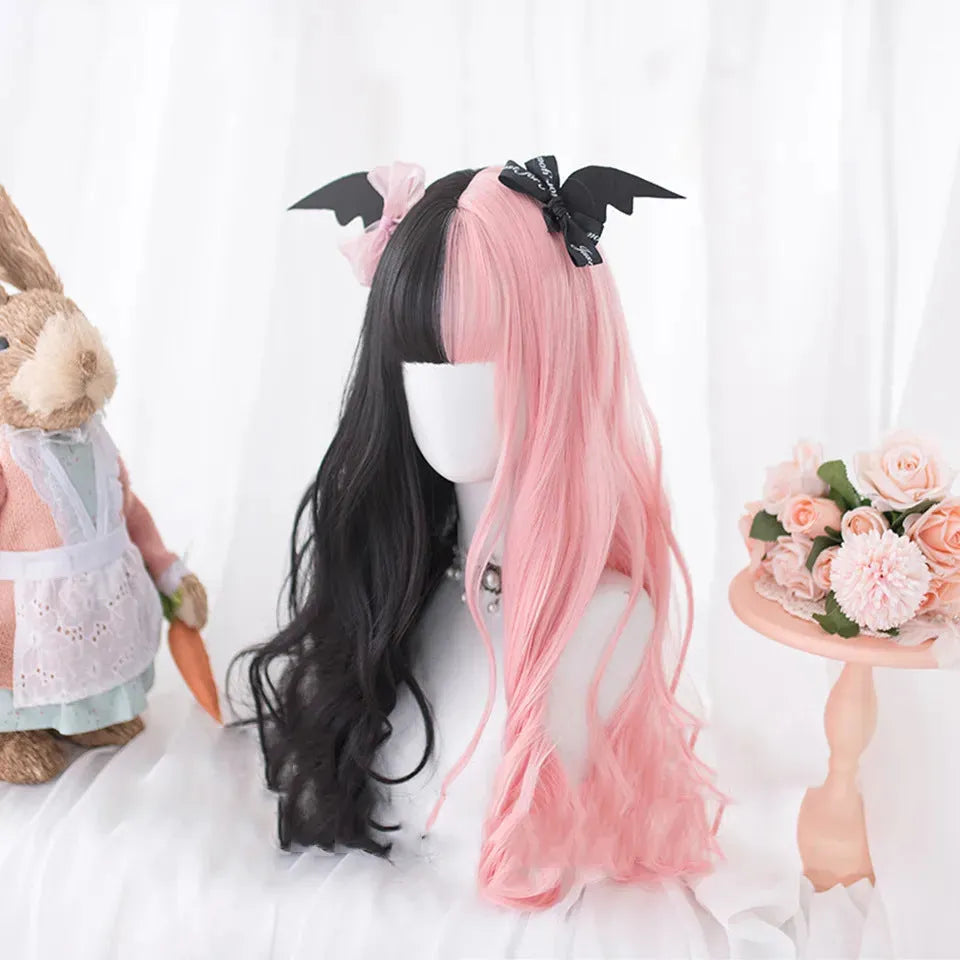 Harajuku Japanese Lolita long curly black and pink wig with full fringe, shown on a model.