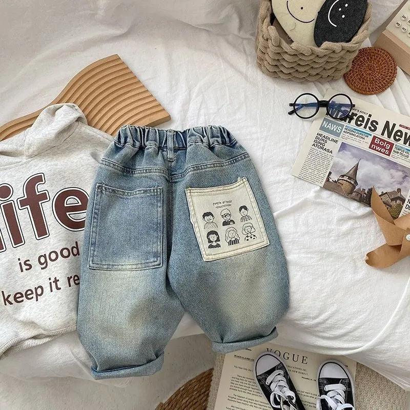Boys casual light-coloured denim jeans with elastic waist and back pocket printing