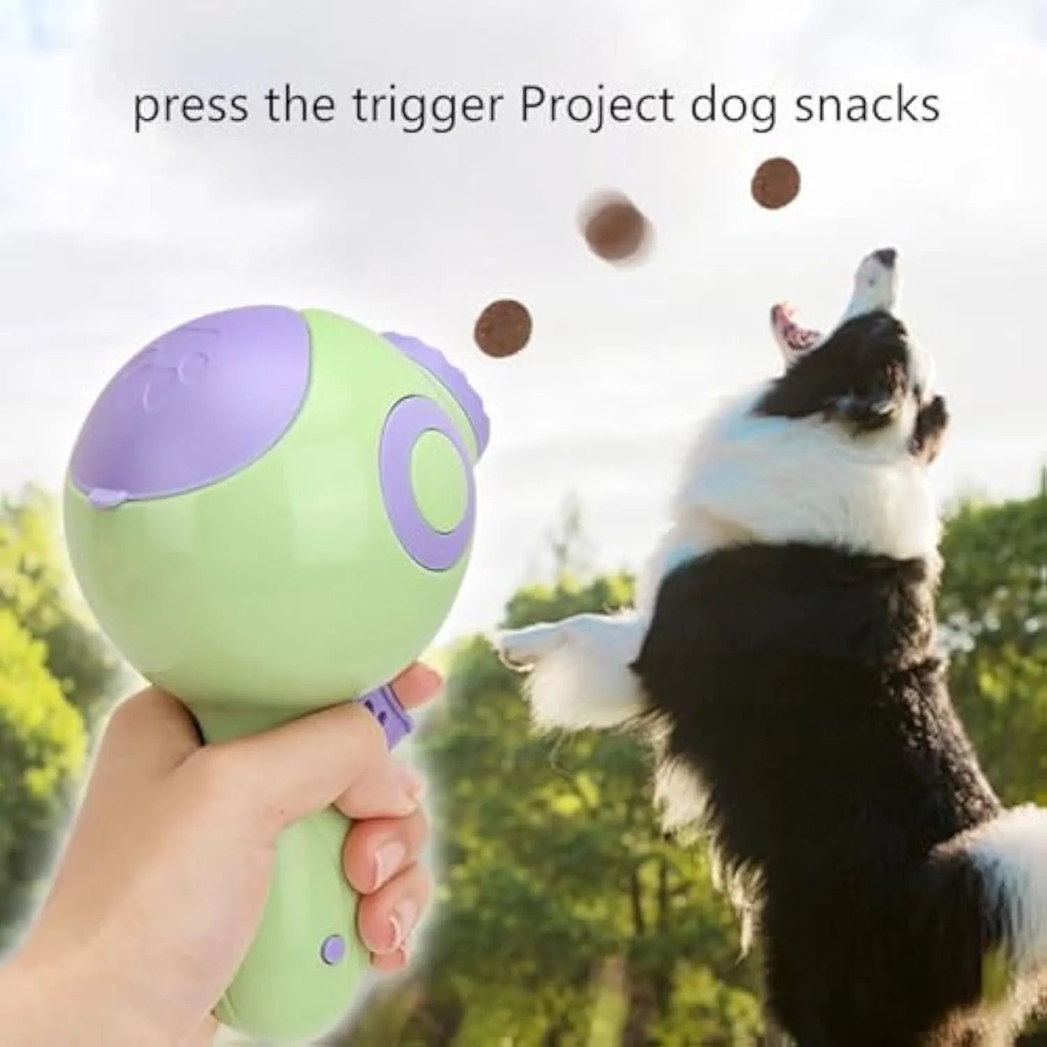 Green, orange or pink plastic dog treat launcher toy for interactive feeding and training