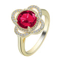 Copper ring with a fruit-shaped setting holding a zircon stone.